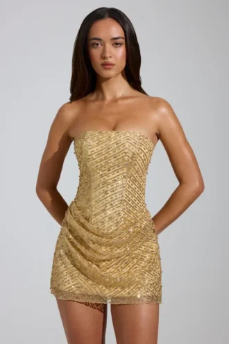 Vestito a trapezio con fascia decorata Amalina in oro