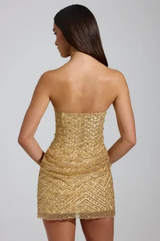 Vestito a trapezio con fascia decorata Amalina in oro