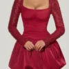 Vestito Aletta con orlo a palloncino decorato in rosso Vestito Aletta con orlo a palloncino decorato in rosso