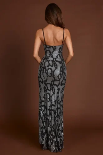 Vestito con collo a cappuccio e spacchi decorati Velia in serpente argento