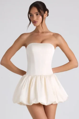 Vestito corto a corsetto con orlo a palloncino e allacciatura Fabiola in avorio