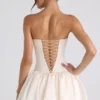 Vestito corto a corsetto con orlo a palloncino e allacciatura Fabiola in avorio