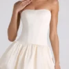 Vestito corto a corsetto con orlo a palloncino e allacciatura Fabiola in avorio