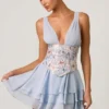 Vestito corto a corsetto con volant decorati Sakura in blu floreale Vestito corto a corsetto con volant decorati Sakura in blu floreale