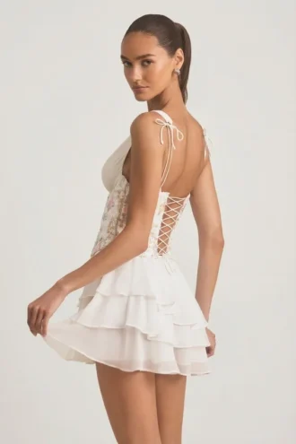 Vestito corto a corsetto con volant e decorazioni Sakura in avorio