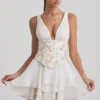 Vestito corto a corsetto con volant e decorazioni Sakura in avorio