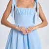 Vestito corto a corsetto drappeggiato Bellamy in blu polvere