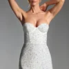 Vestito corto a corsetto senza spalline Crystella con decorazioni in bianco