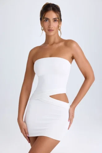 Vestito corto a fascia con cut-out Damia in bianco