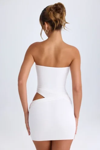 Vestito corto a fascia con cut-out Damia in bianco