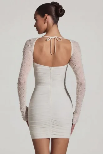 Vestito corto a maniche lunghe con decorazioni St Germain in bianco