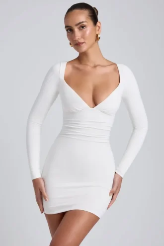 Vestito corto a maniche lunghe con ruches in modal Sana, bianco