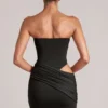 Vestito corto aderente a fascia Veda in nero Vestito corto aderente a fascia Veda in nero