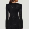 Vestito corto aderente asimmetrico con decorazioni Nevina in nero