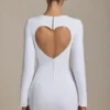 Vestito corto aderente con cut-out a forma di cuore Adelia in bianco Vestito corto aderente con cut-out a forma di cuore Adelia in bianco