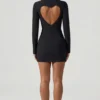 Vestito corto aderente con cut-out a forma di cuore Adelia in nero Vestito corto aderente con cut-out a forma di cuore Adelia in nero