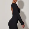 Vestito corto aderente con cut-out a forma di cuore Adelia in nero Vestito corto aderente con cut-out a forma di cuore Adelia in nero