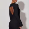 Vestito corto aderente con cut-out a forma di cuore Adelia in nero Vestito corto aderente con cut-out a forma di cuore Adelia in nero