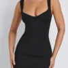 Vestito corto aderente con scollo a cuore in modal Dove, colore nero Vestito corto aderente con scollo a cuore in modal Dove, colore nero