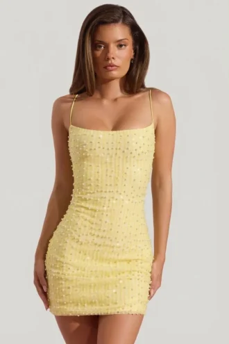 Vestito corto aderente con scollo rotondo decorato Lunetta in giallo