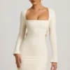 Vestito corto Akari con dettagli in perle e cut-out in avorio Vestito corto Akari con dettagli in perle e cut-out in avorio