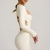 Vestito corto Akari con dettagli in perle e cut-out in avorio Vestito corto Akari con dettagli in perle e cut-out in avorio