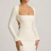 Vestito corto Akari con dettagli in perle e cut-out in avorio Vestito corto Akari con dettagli in perle e cut-out in avorio