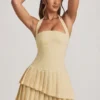 Vestito corto asimmetrico a strati con scollo all’americana Rosaria in giallo pastello