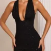 Vestito corto Cassis con scollo a V decorato, nero Vestito corto Cassis con scollo a V decorato, nero