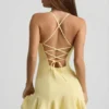 Vestito corto con allacciatura e vita bassa Daria in giallo Vestito corto con allacciatura e vita bassa Daria in giallo