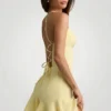 Vestito corto con allacciatura e vita bassa Daria in giallo Vestito corto con allacciatura e vita bassa Daria in giallo