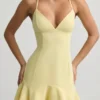 Vestito corto con allacciatura e vita bassa Daria in giallo Vestito corto con allacciatura e vita bassa Daria in giallo