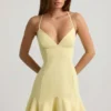 Vestito corto con allacciatura e vita bassa Daria in giallo Vestito corto con allacciatura e vita bassa Daria in giallo