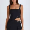 Vestito corto con cintura e cut-out Acadia in nero Vestito corto con cintura e cut-out Acadia in nero