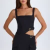 Vestito corto con cintura e cut-out Acadia in nero Vestito corto con cintura e cut-out Acadia in nero