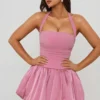 Vestito corto con corpetto allacciato sul collo all’americana e orlo a palloncino Ludmila in malva Vestito corto con corpetto allacciato sul collo all’americana e orlo a palloncino Ludmila in malva