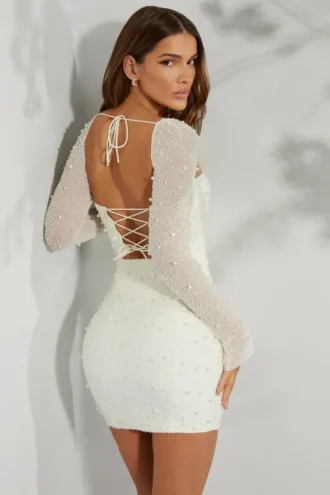 Vestito corto con corsetto decorato a maniche lunghe Milan in avorio