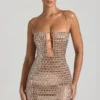 Vestito corto con cut-out decorato Alanni in color miele Vestito corto con cut-out decorato Alanni in color miele