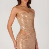 Vestito corto con cut-out decorato Rania in oro Vestito corto con cut-out decorato Rania in oro