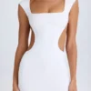 Vestito corto con cut-out e allacciatura Addison in bianco Vestito corto con cut-out e allacciatura Addison in bianco