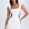 Vestito corto con cut-out e allacciatura Addison in bianco Vestito corto con cut-out e allacciatura Addison in bianco