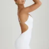 Vestito corto con cut-out e schiena scoperta Eartha in bianco Vestito corto con cut-out e schiena scoperta Eartha in bianco