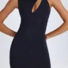 Vestito corto con cut-out intrecciato Parina in nero Vestito corto con cut-out intrecciato Parina in nero