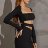 Vestito corto con maniche lunghe e cut-out Enya in nero Vestito corto con maniche lunghe e cut-out Enya in nero