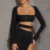 Vestito corto con maniche lunghe e cut-out Enya in nero Vestito corto con maniche lunghe e cut-out Enya in nero