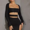 Vestito corto con maniche lunghe e cut-out Enya in nero Vestito corto con maniche lunghe e cut-out Enya in nero