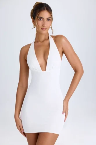 Vestito corto con scollo a barchetta e retro a cappuccio Vella in bianco