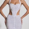 Vestito corto con scollo all’americana e cut-out decorato Lucia in bianco Vestito corto con scollo all’americana e cut-out decorato Lucia in bianco