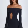 Vestito corto con spalle scoperte e cut-out Madelina in nero Vestito corto con spalle scoperte e cut-out Madelina in nero