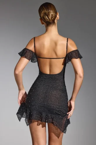 Vestito corto con spalle scoperte e decorazioni Beaufort in nero Vestito corto con spalle scoperte e decorazioni Beaufort in nero